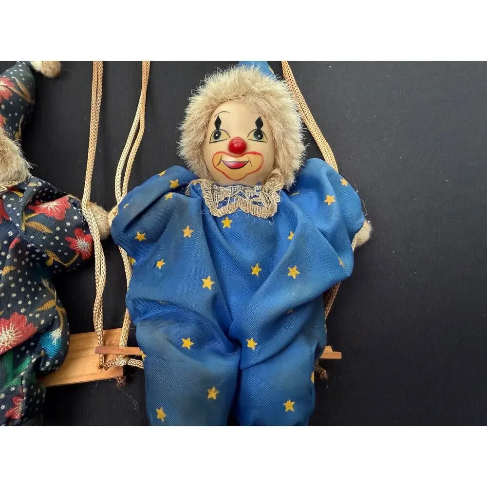 Pair of Vintage Hanging Porcelain Face Clowns Wooden Swings Star Floral Fabric